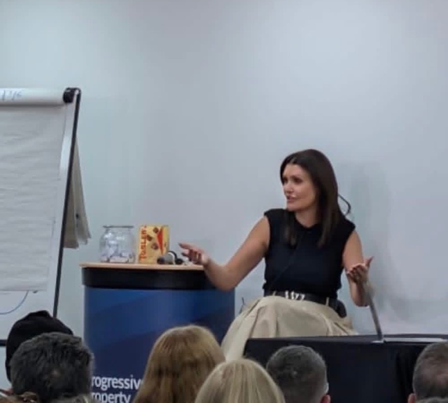 Andrea Cooper speaking to a room of property investors at Progressive Property, Peterborough